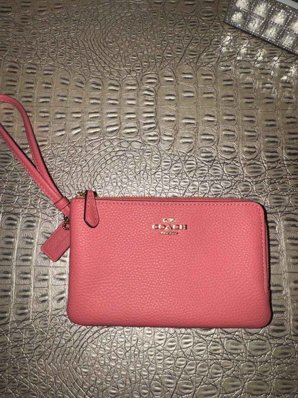 Coach NWOT Pebbled Leather Wristlet - Coral Pink